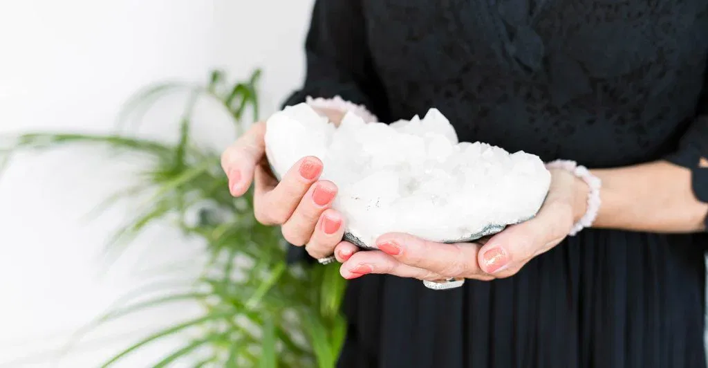 Image of crystals in Melanie's hands